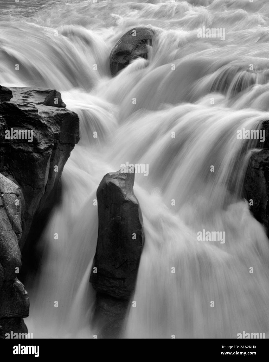 Slow exposure of a raging waterfall Stock Photo
