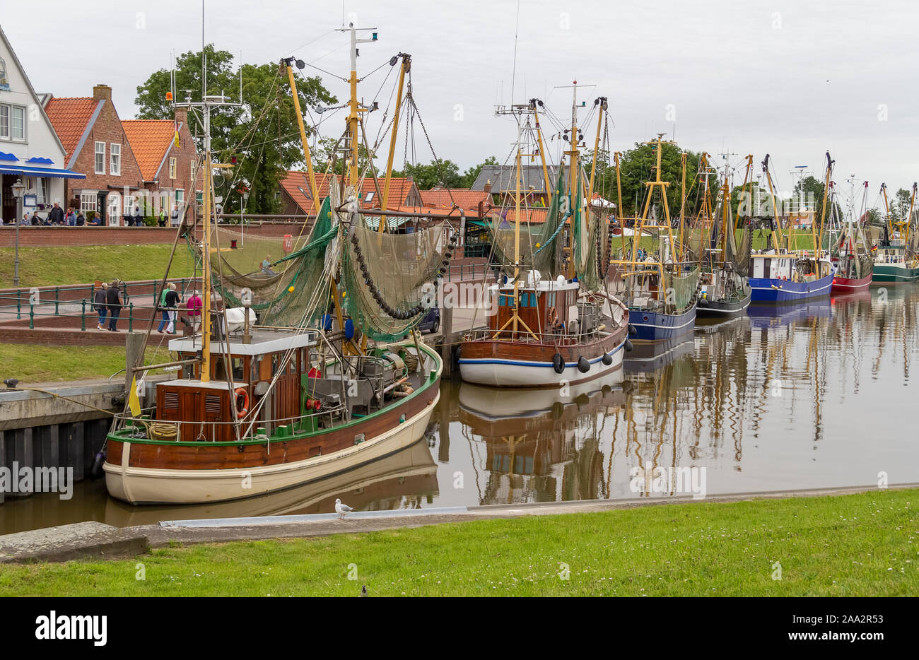 Idyllic port scenery in Greetsiel, a idyllic village located in East Frisia, Northern Germany Stock Photo