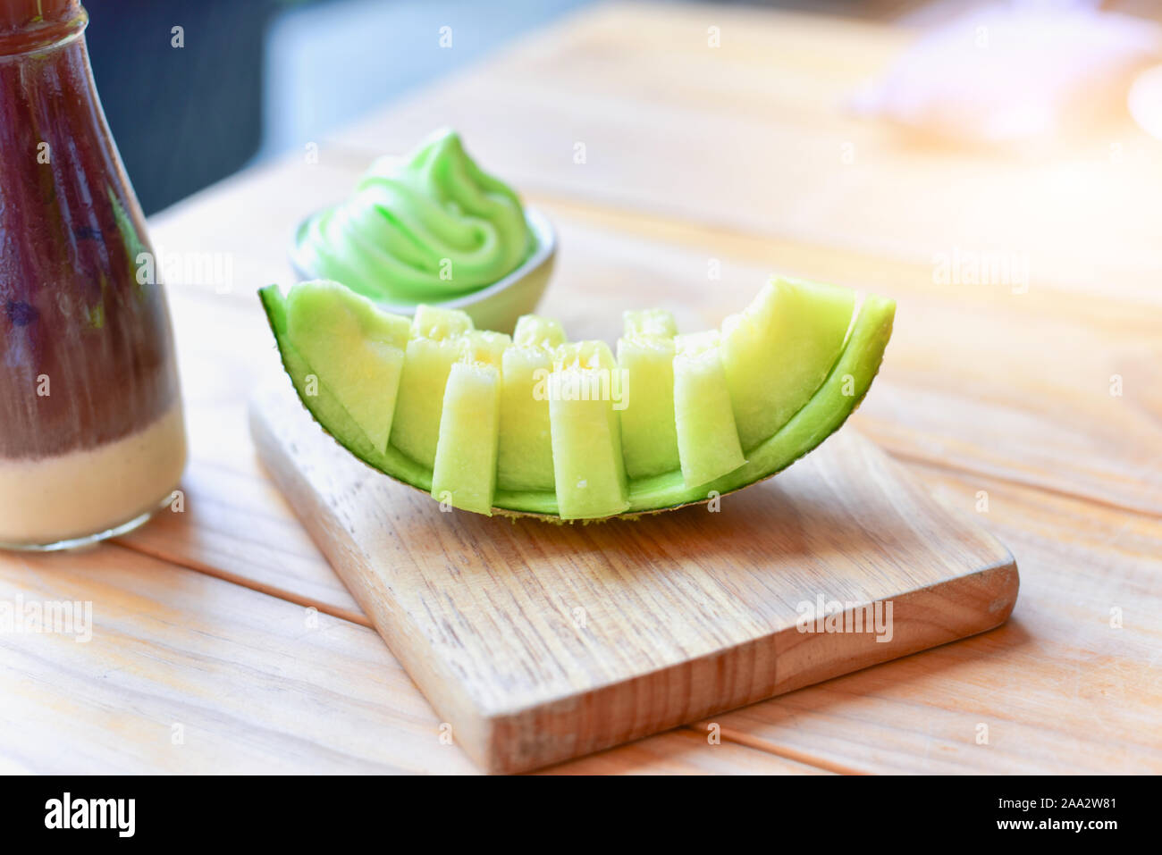 Sliced Green Melon with Green Melon Ice Cream Stock Photo Alamy