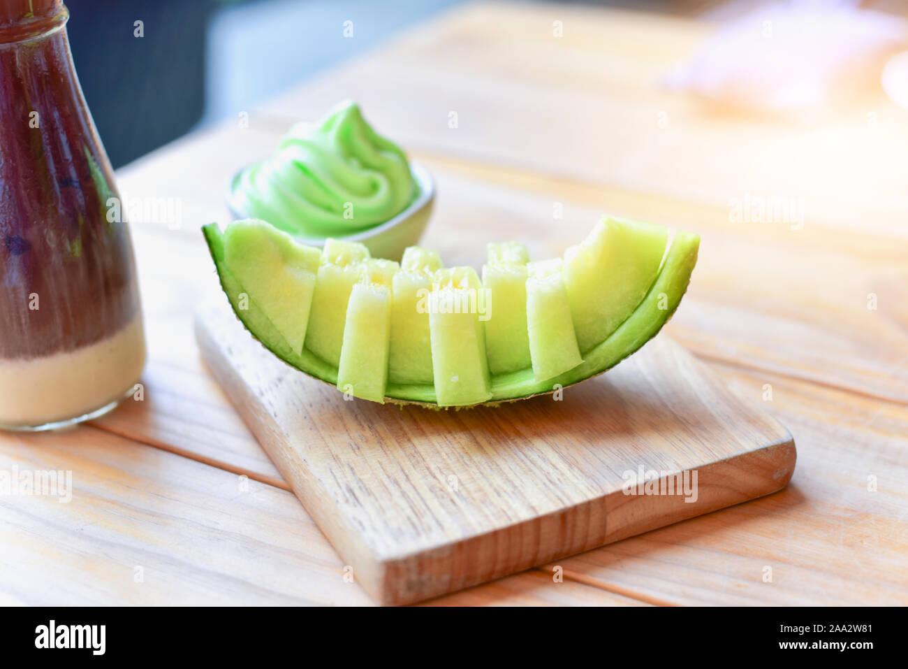 Sliced Green Melon with Green Melon Ice Cream Stock Photo