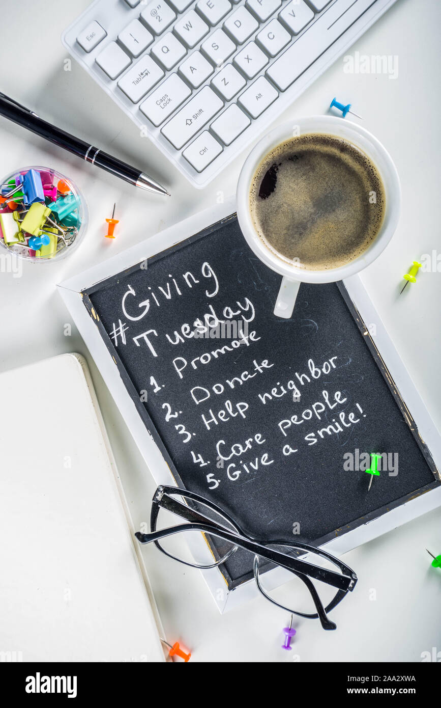 Chalk board with list of tasks, ideas, task for Giving Tuesday. Notes ...