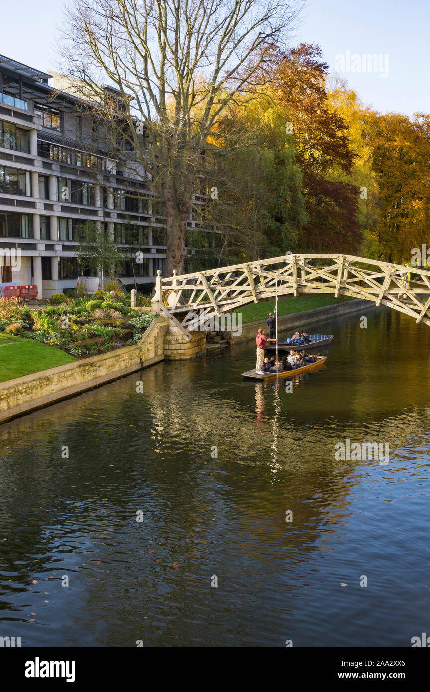 Punting on the Cam under the Mathematical bridge in autumn 2019 Stock Photo