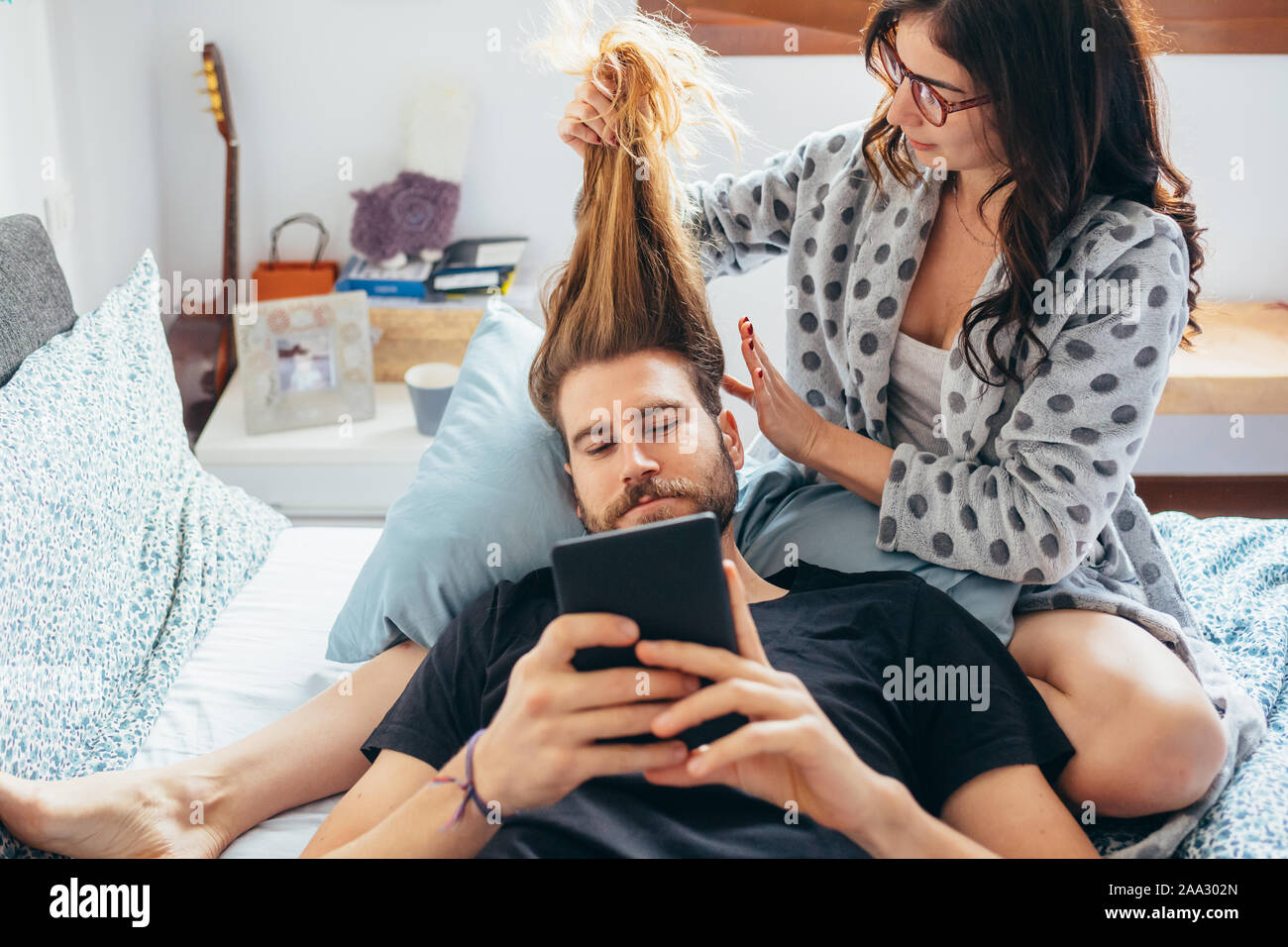 Young Beautiful Woman Stroking Hair Of Bearded Man While He Is Using Tablet Love Relationship Tenderness Concept Stock Photo Alamy Young Beautiful Woman Stroking Hair Of Bearded Man While He Is Using Tablet Love Relationship Tenderness Concept Stock Photo Alamy