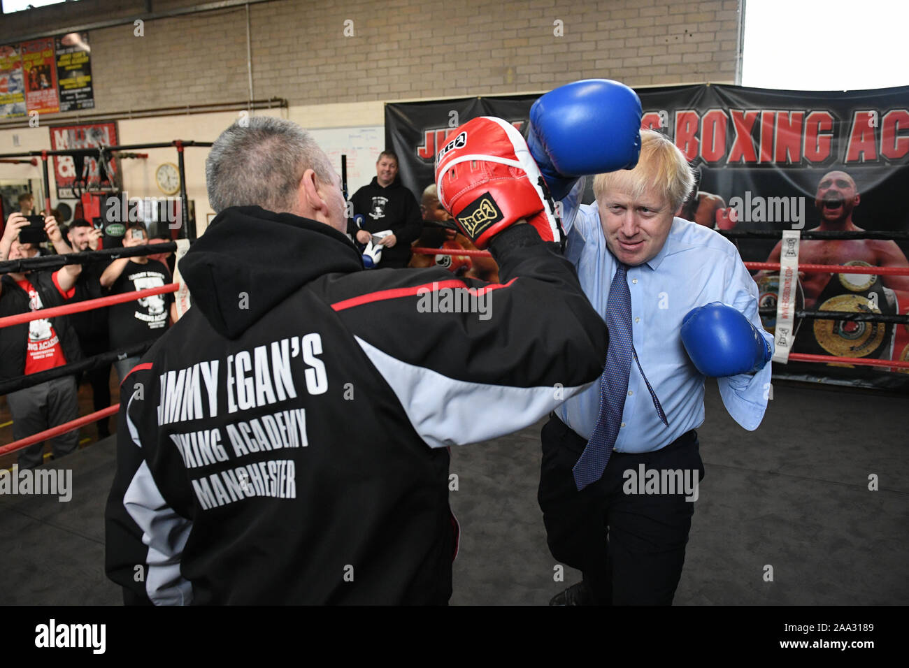 Prime Minister Boris Johnson during a visit to Jimmy Egan's Boxing Academy at Wythenshawe, while on the campaign trail ahead of the General Election. Stock Photo