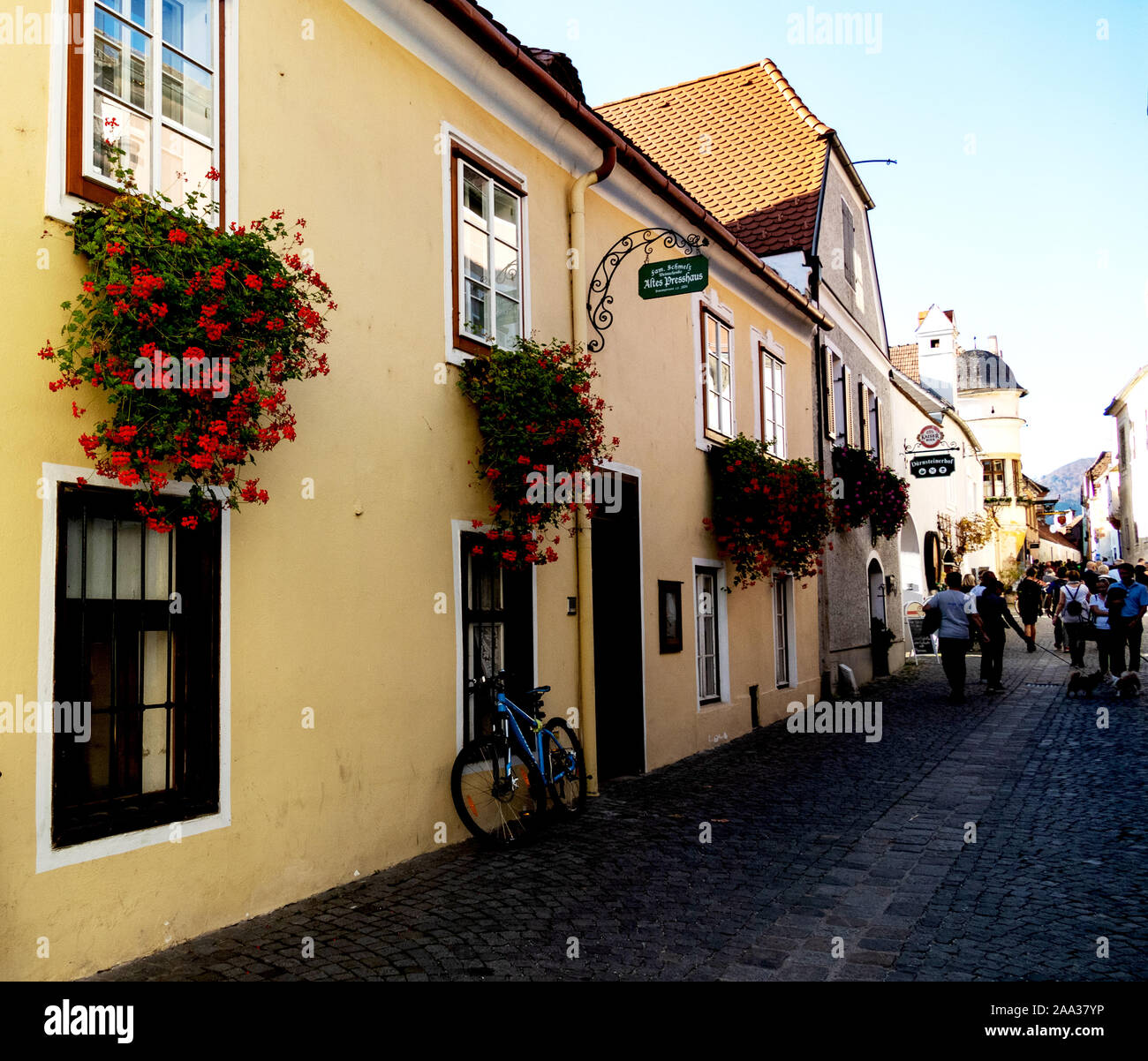 People shopping in the main street of Durnstein, Austria Stock Photo
