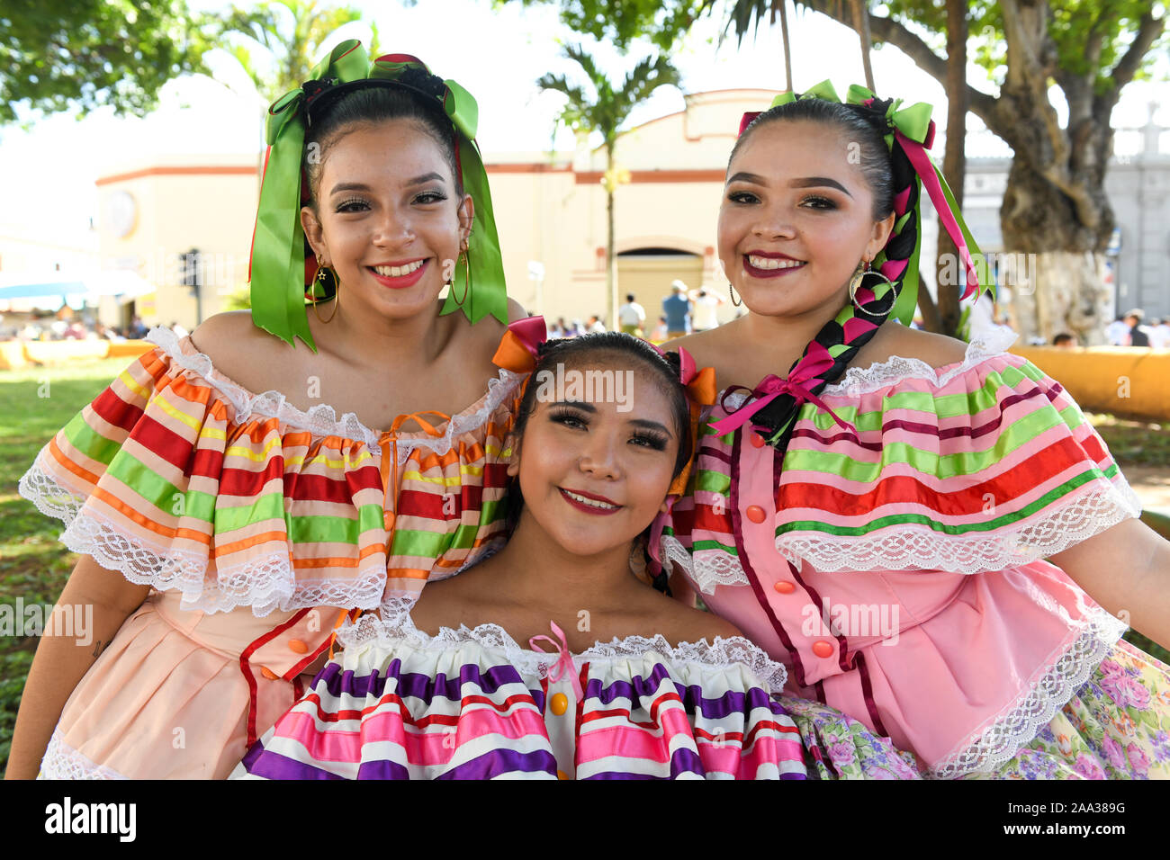 Young Mexican women in traditional costumes on Revolution Day, Merida Stock Photo