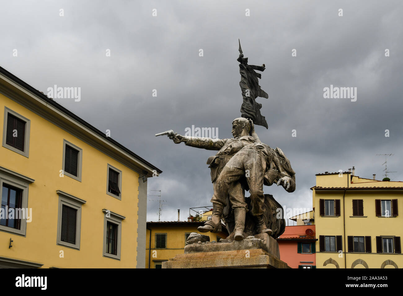 Monument to the fallen of Mentana by Oreste Calzolari in Piazza Mentana square in the historic centre of Florence with stormy sky, Tuscany, Italy Stock Photo