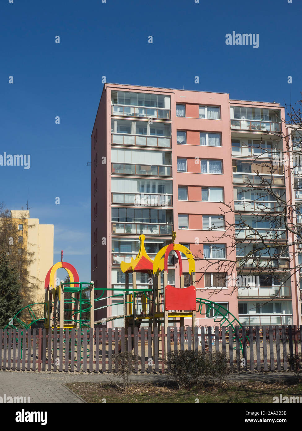 Apartment block and playground near Velká skála  in the suburbs of Prague Czech Republic Stock Photo