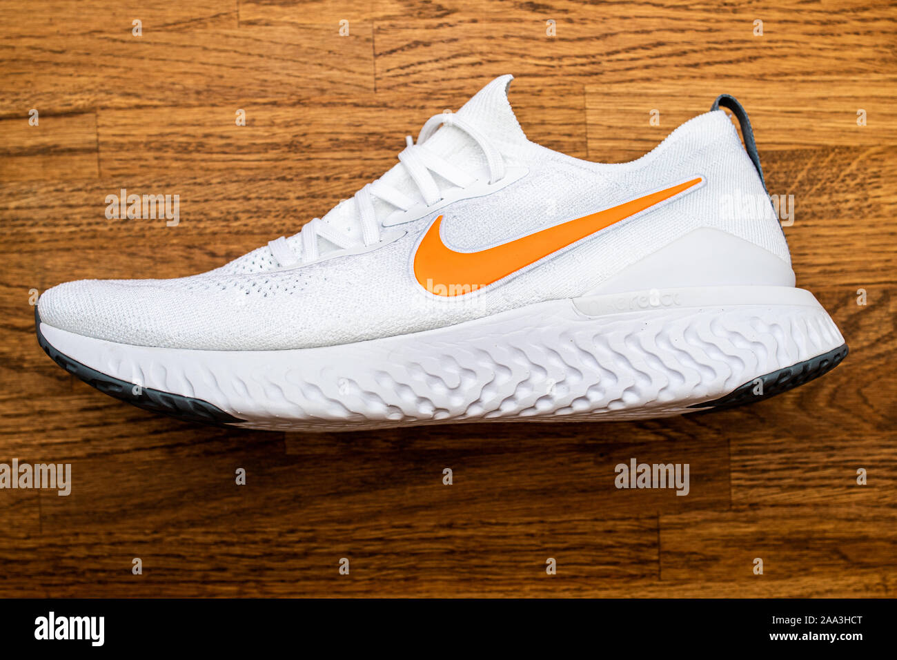 Paris, France - Jul 8, 2019: View from above of new Nike Epic React flyknit  running professional shoe with orange Nike Swoosh logotype Stock Photo -  Alamy