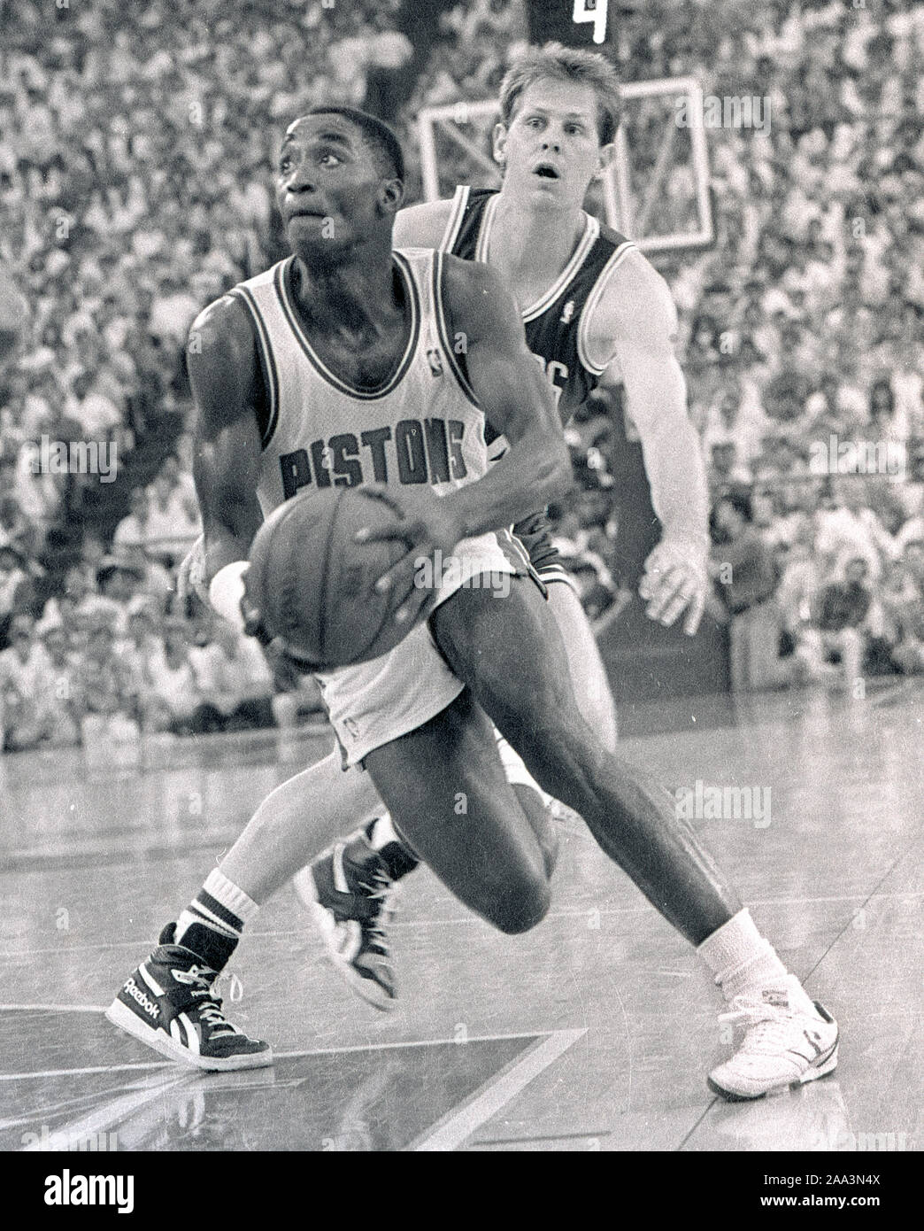 Detroit Pistons Isiah Thomas in game action during the NBA playoffs against the Boston Celtics in Detroit Michigan USA ,May1988 photo by bill belknap Stock Photo