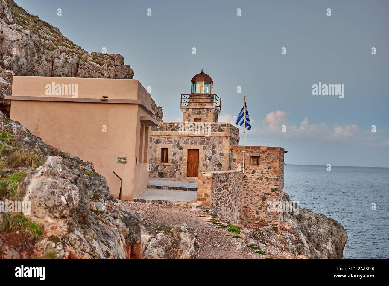 Old Lighthouse into the picturesque castle town of Monemvasia during winter. Architectural stone buildings and beautiful narrow paved streets. Stock Photo