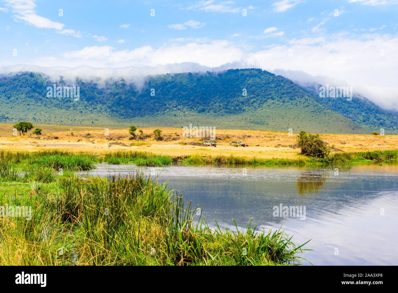Panorama of Ngorongoro crater National Park with the Lake Magadi. Safari Tours in Savannah of Africa. Beautiful landscape scenery in Tanzania, Africa Stock Photo