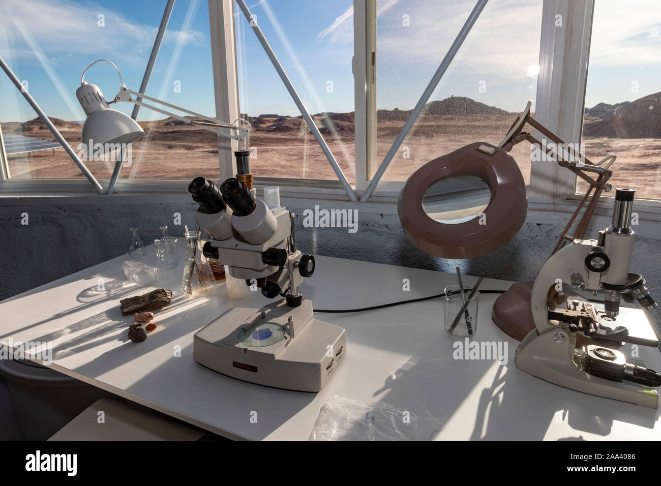 Hanksville, Utah - Researchers simulate living on Mars at the Mars Desert Research Station. They work on science projects in the habitat's science dom Stock Photo