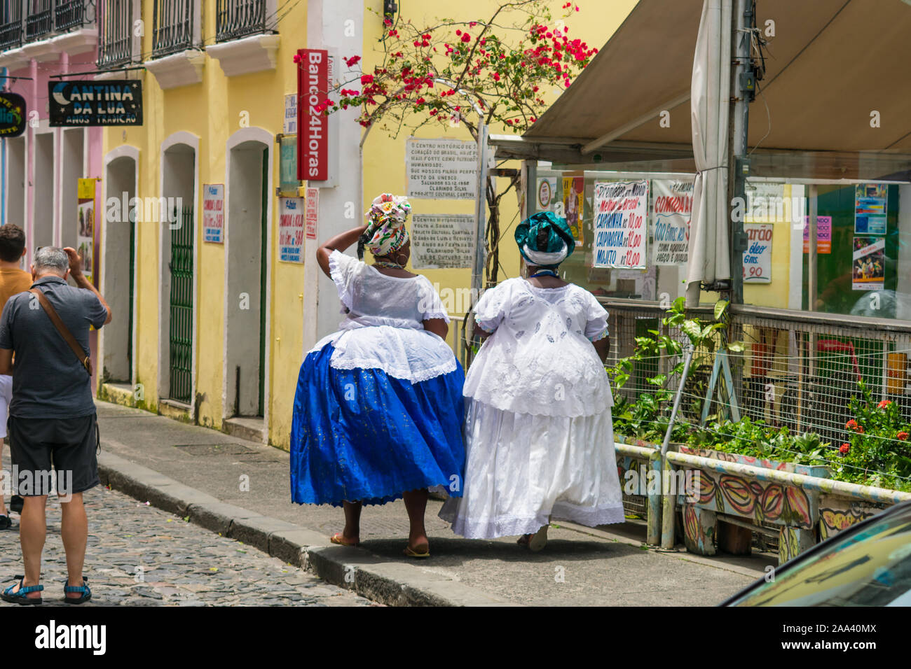 Two Baianas (women from Bahia) dressed in traditional clothes at Terreiro de Jesus Square - historic center of Salvador Stock Photo