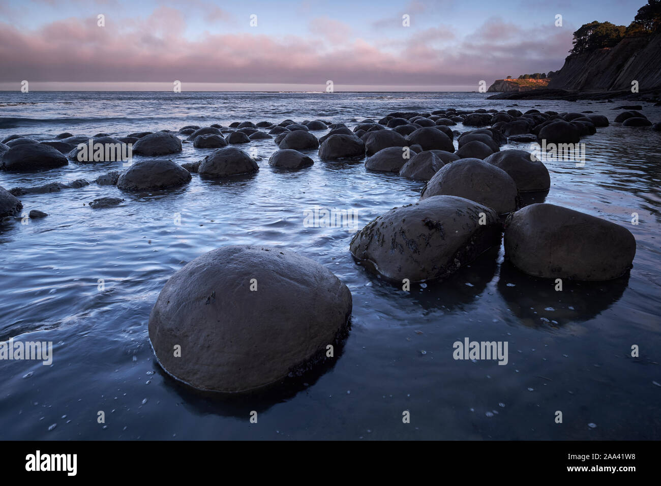 Rock formations in the Pacific Ocean at Bowling Ball Beach, California, USA Stock Photo