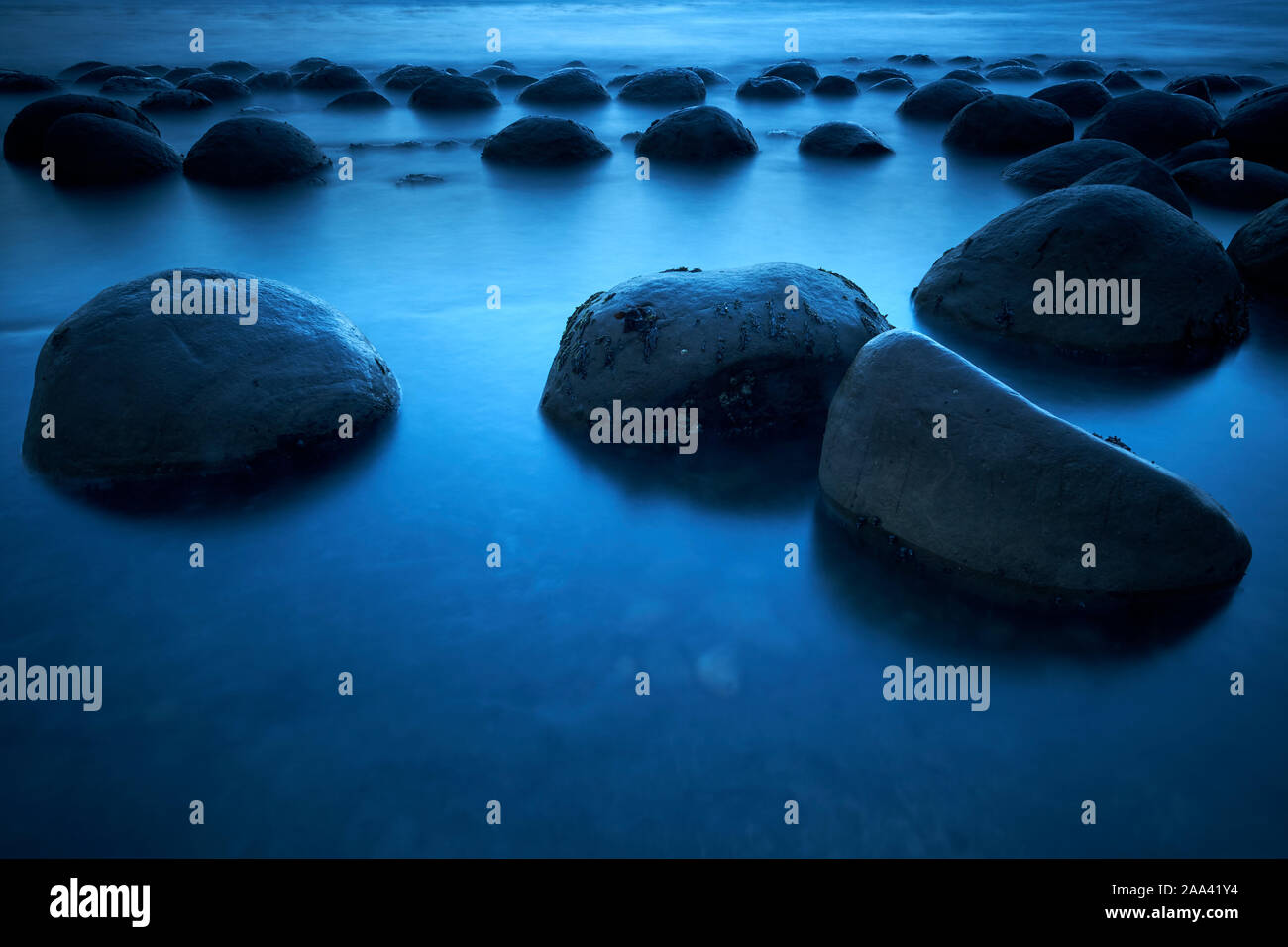 Rock formations in the Pacific Ocean at Bowling Ball Beach, California, USA Stock Photo