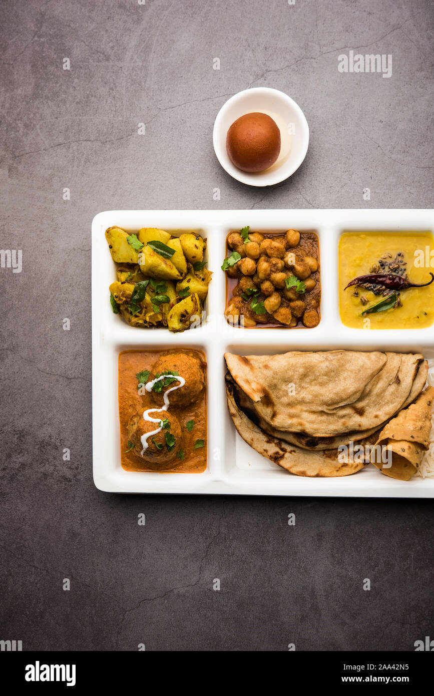 Indian vegetarian Food Thali or Parcel food-tray with compartments in ...