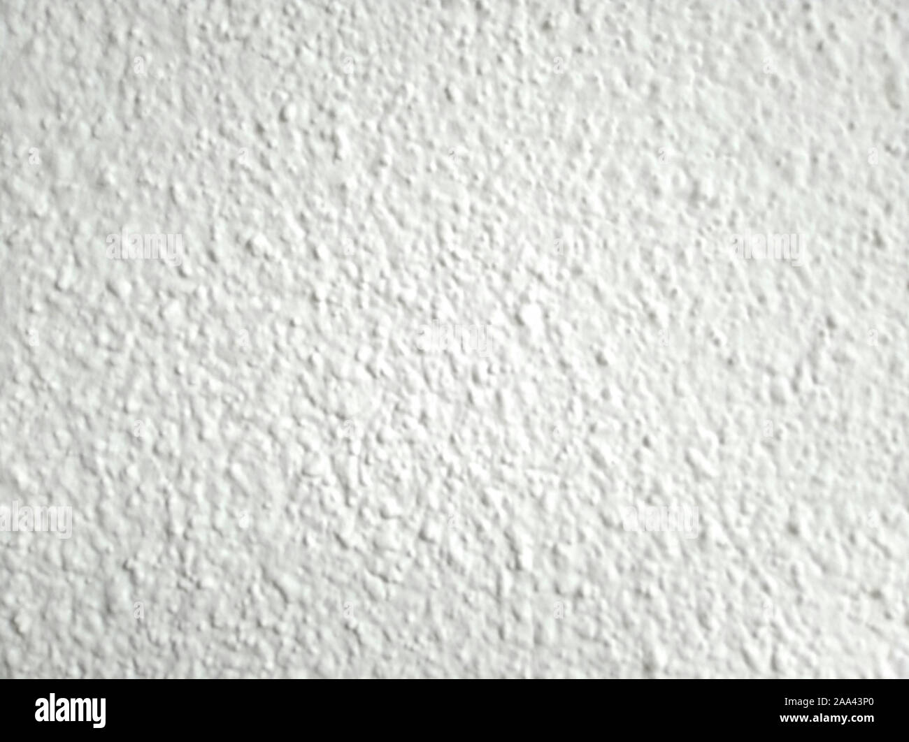 Wall background texture - rustic bumpy flat white surface Stock Photo
