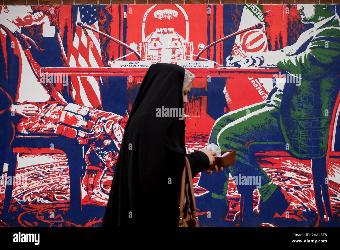 Tehran Iran 19th Nov 2019 A Woman In Black Chador Walks Past A