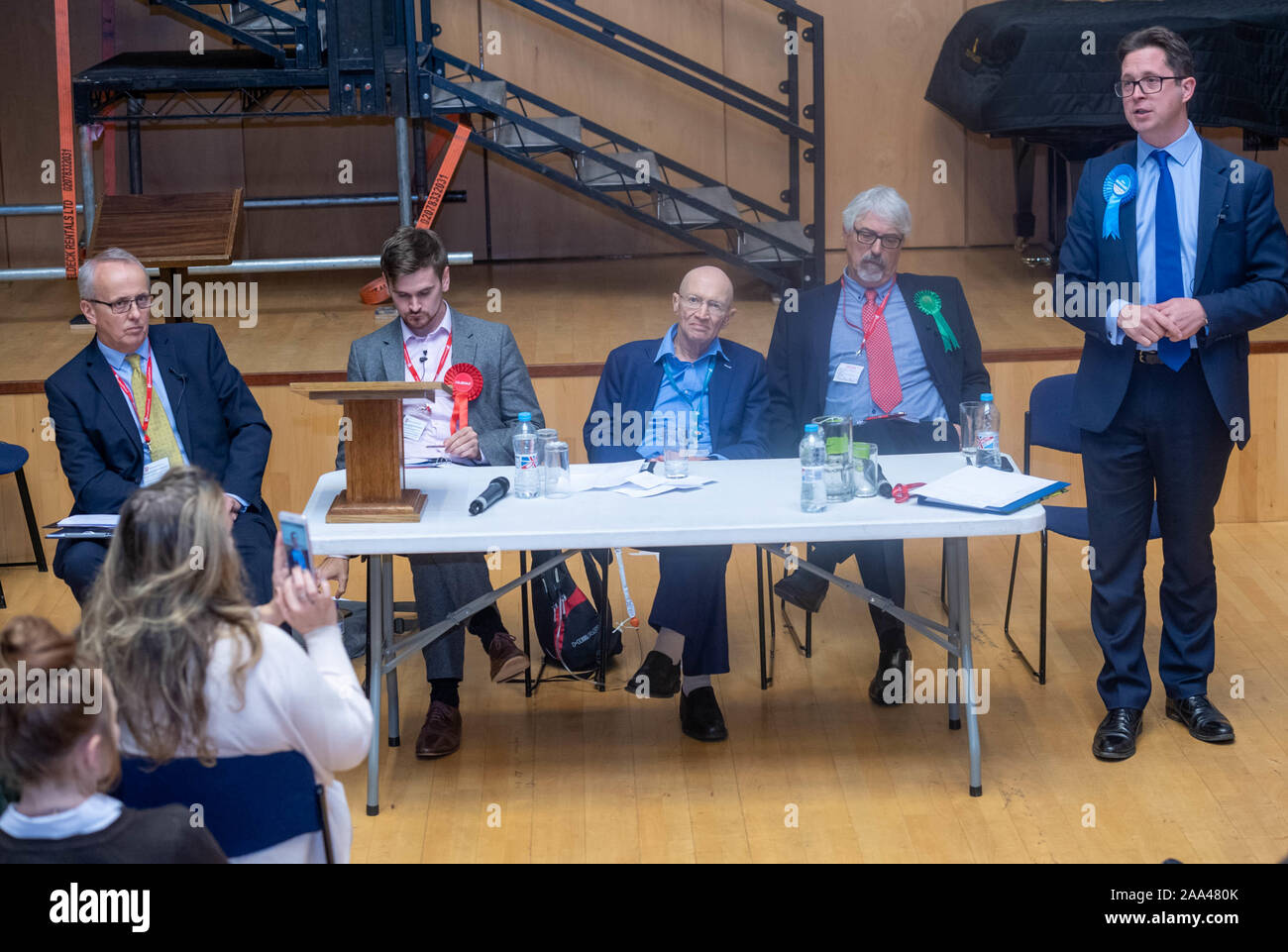 Brentwood Essex UK 19th Nov. 2019 General Election 2109 Brentwood General Election campaign hustings at the elite public Brentwood School Brentwood, Essex   Note: Robin Tilbrook, the English Democrat candidate was not invited to the debate pictured left to right, David Kendall, Liberal democrats, Oliver Durose, the labour party Mike Willis, Brentwood School, chairing the debate, Paul Jeater, Green party, and Alex Burghart, Conservative party  Credit Ian DavidsonAlamy Live News Stock Photo