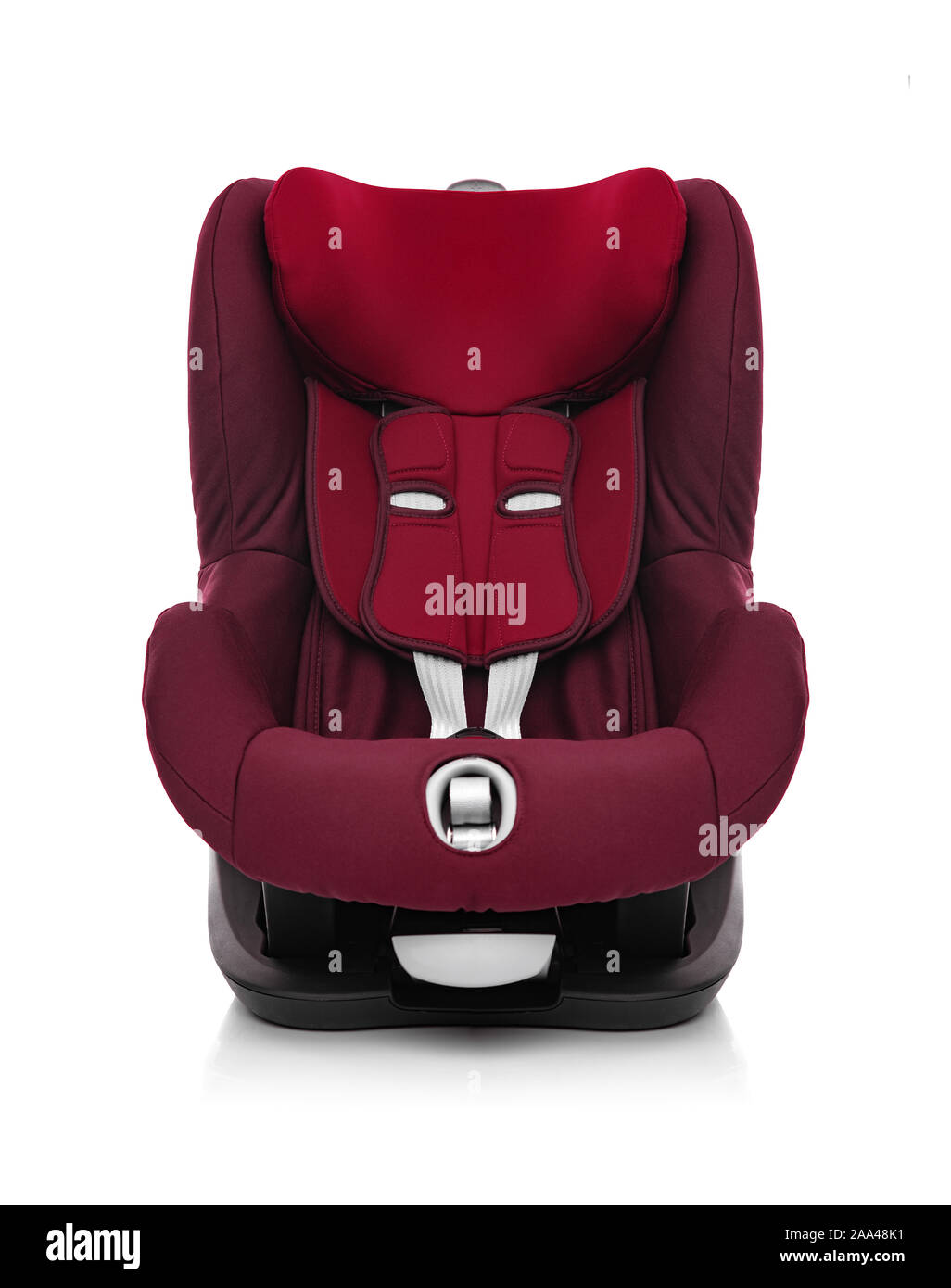 The child car seat is isolated on a white background. Stock Photo