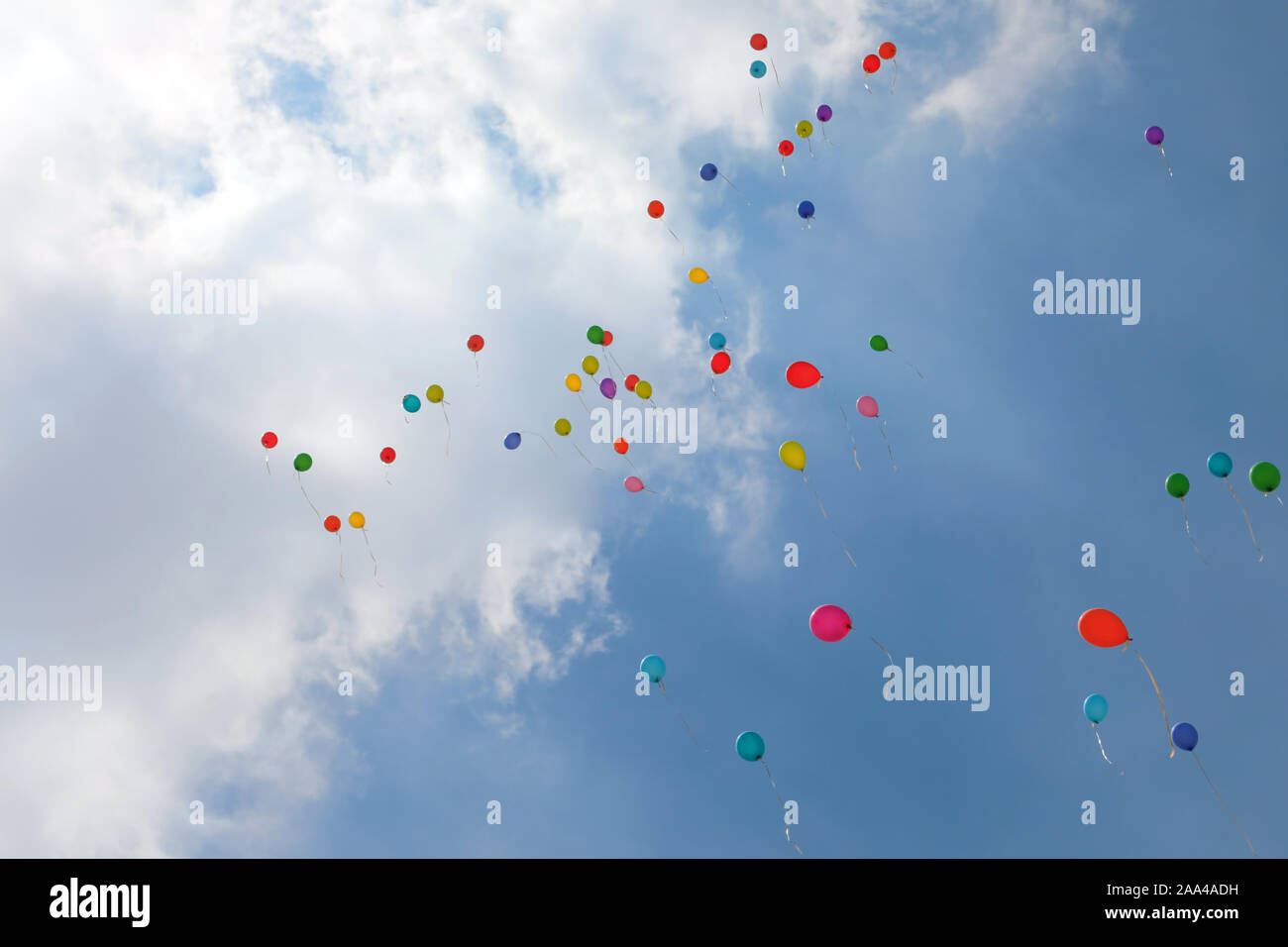 colorful balloons on the air with blue sky and white clouds Stock Photo ...