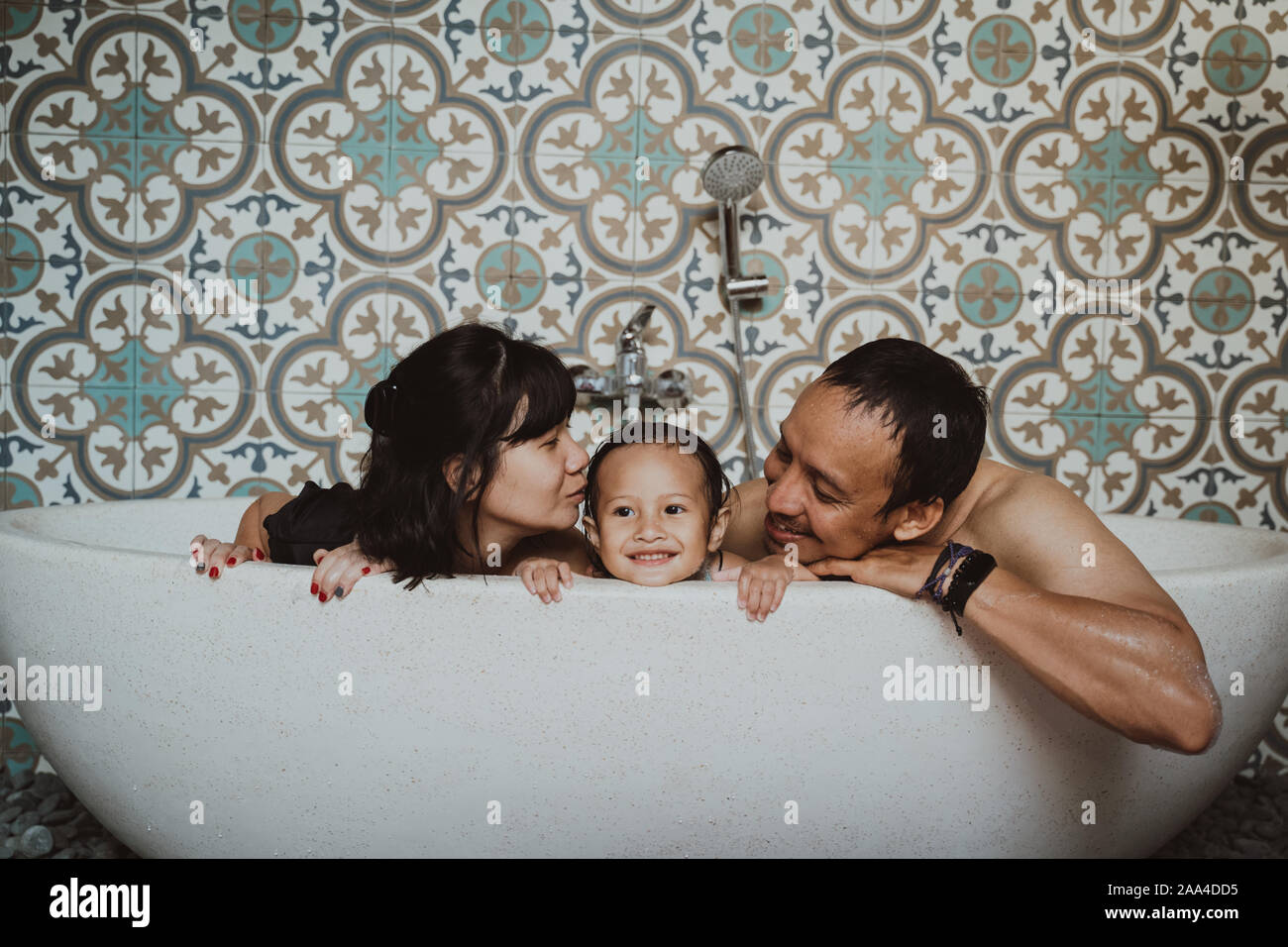 happy family with little daughter in bathtub Stock Photo Alamy