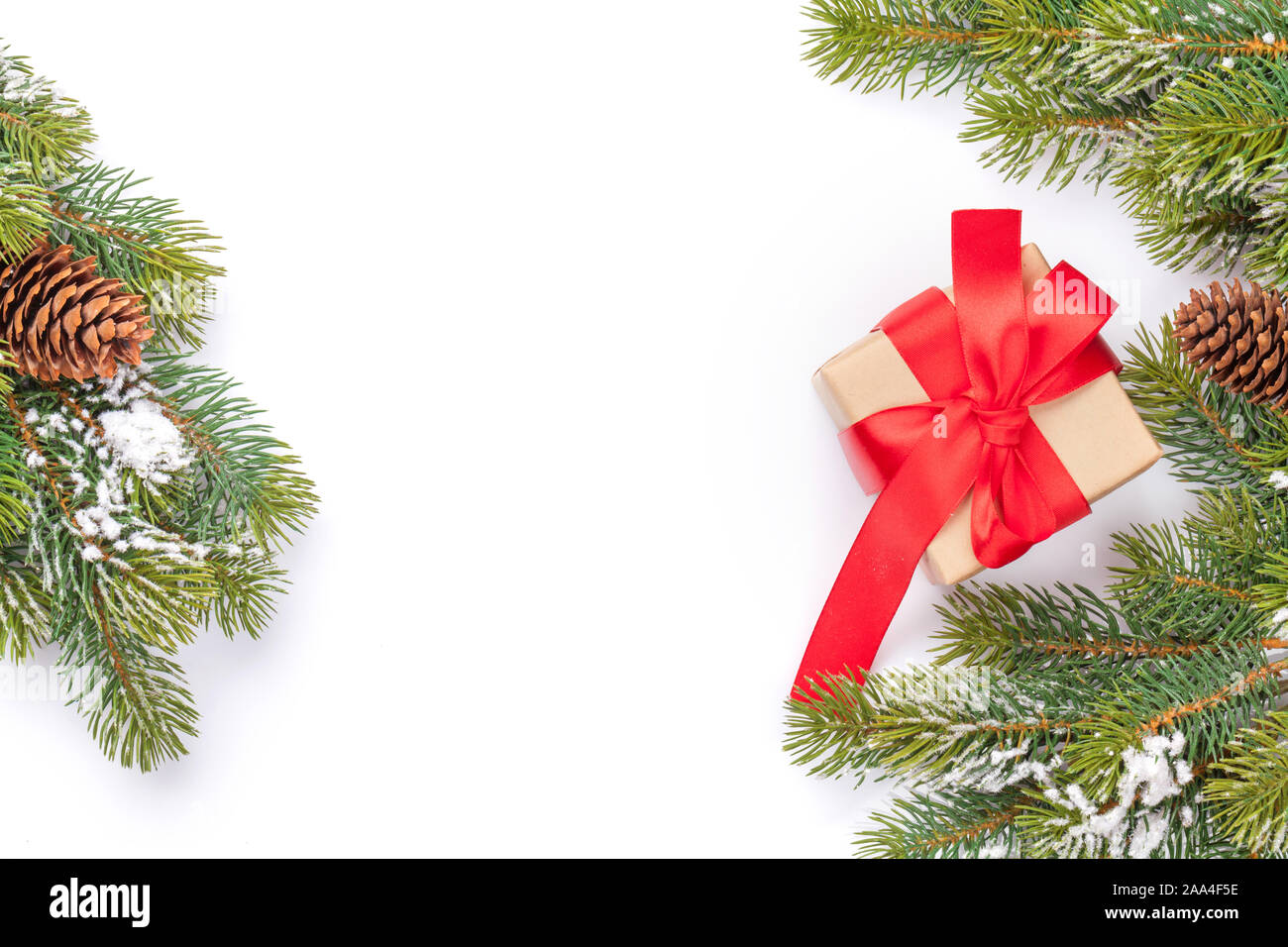 Christmas greeting card with fir tree and gift box over white ...