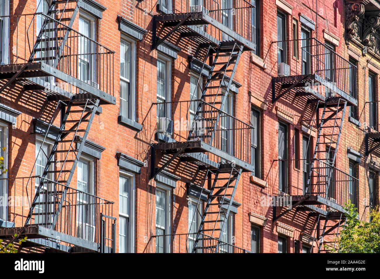 Old building with metal fire escape stairs ladders, East Village, Manhattan, New York, USA Stock Photo