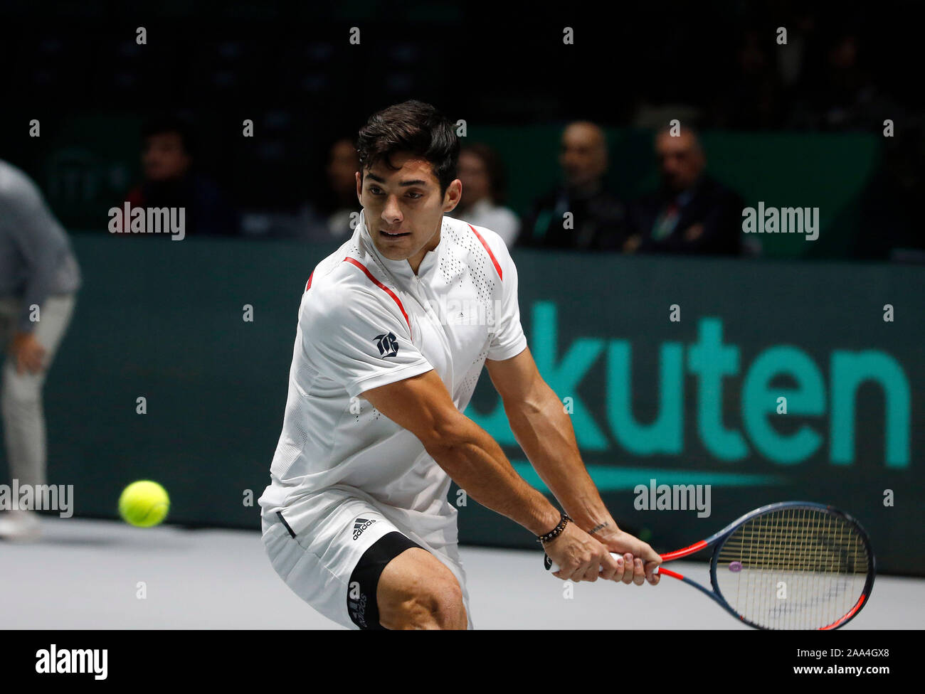 Cristian Garin of Chile in action during the singles match against Diego Schwartzman of Argentina on Day 2 of the 2019 Davis Cup at La Caja Magica. Stock Photo