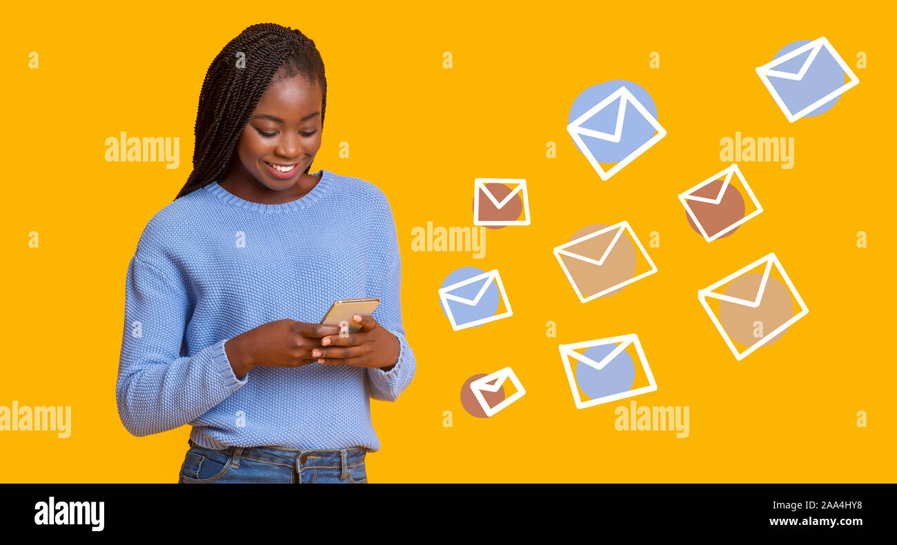 Woman typing text message on smartphone, flying email envelopes Stock ...
