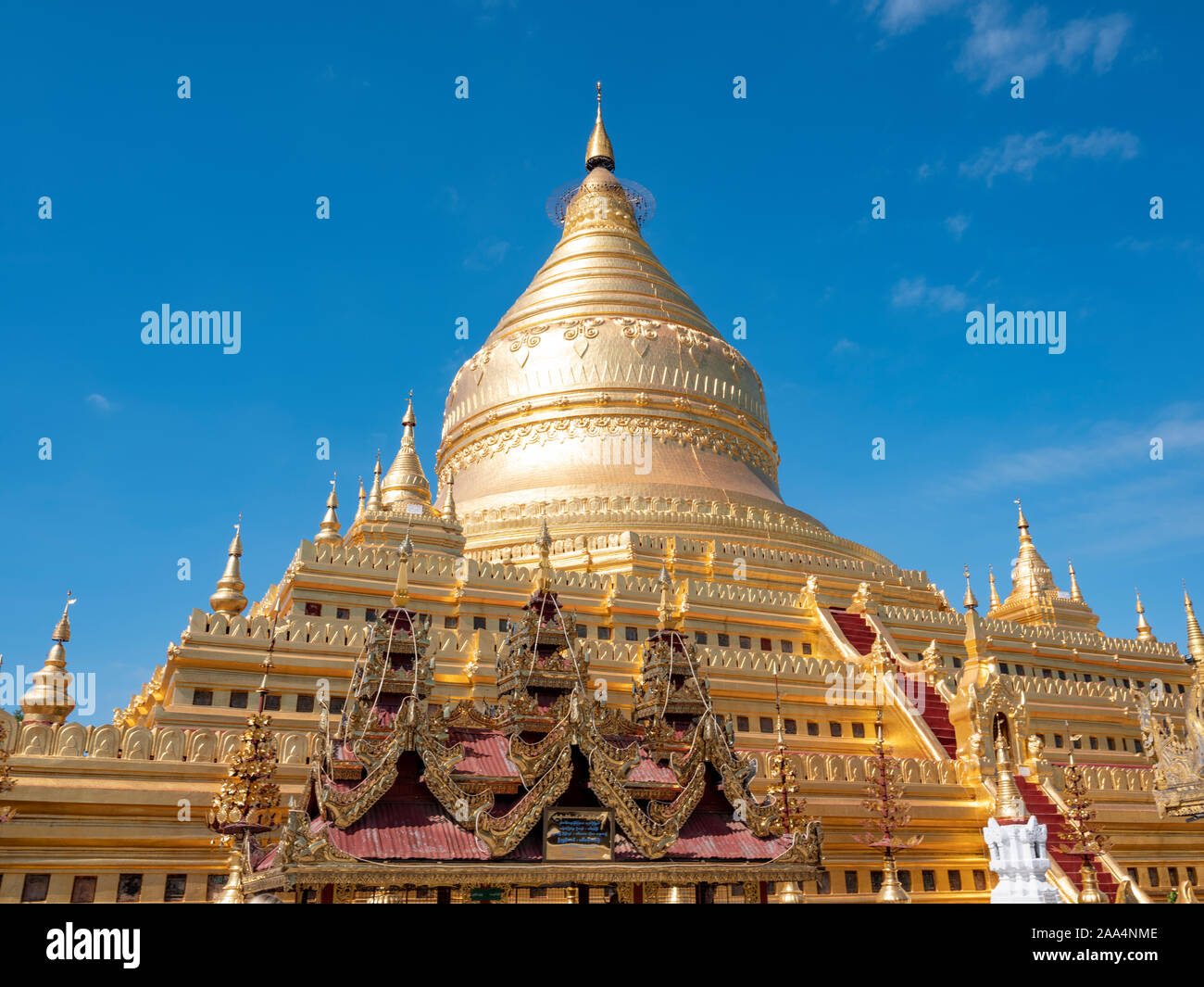 The gold leafed gilded stupa of the Shwezigon Pagoda finished in the 12th century and situated in Bagan (Pagan), Myanmar (Burma) Stock Photo