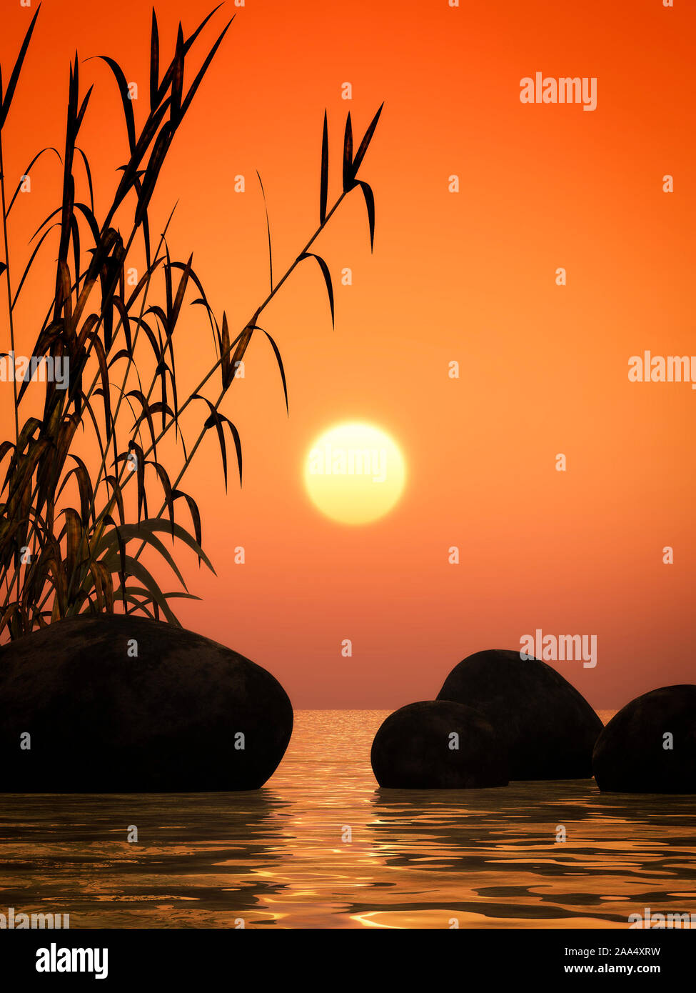 Ein wunderschoener Sonnenuntergang hinter Steinen und Bambus Stock Photo