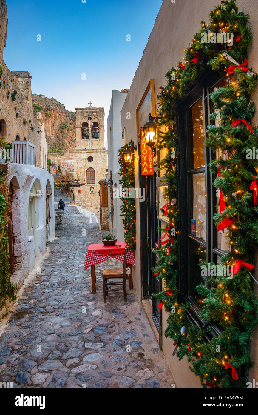Christmas atmosphere in the medieval castle town of Monemvasia, Greece. Decorated store fronts for christmas in Monemvasia, Laconia, Stock Photo