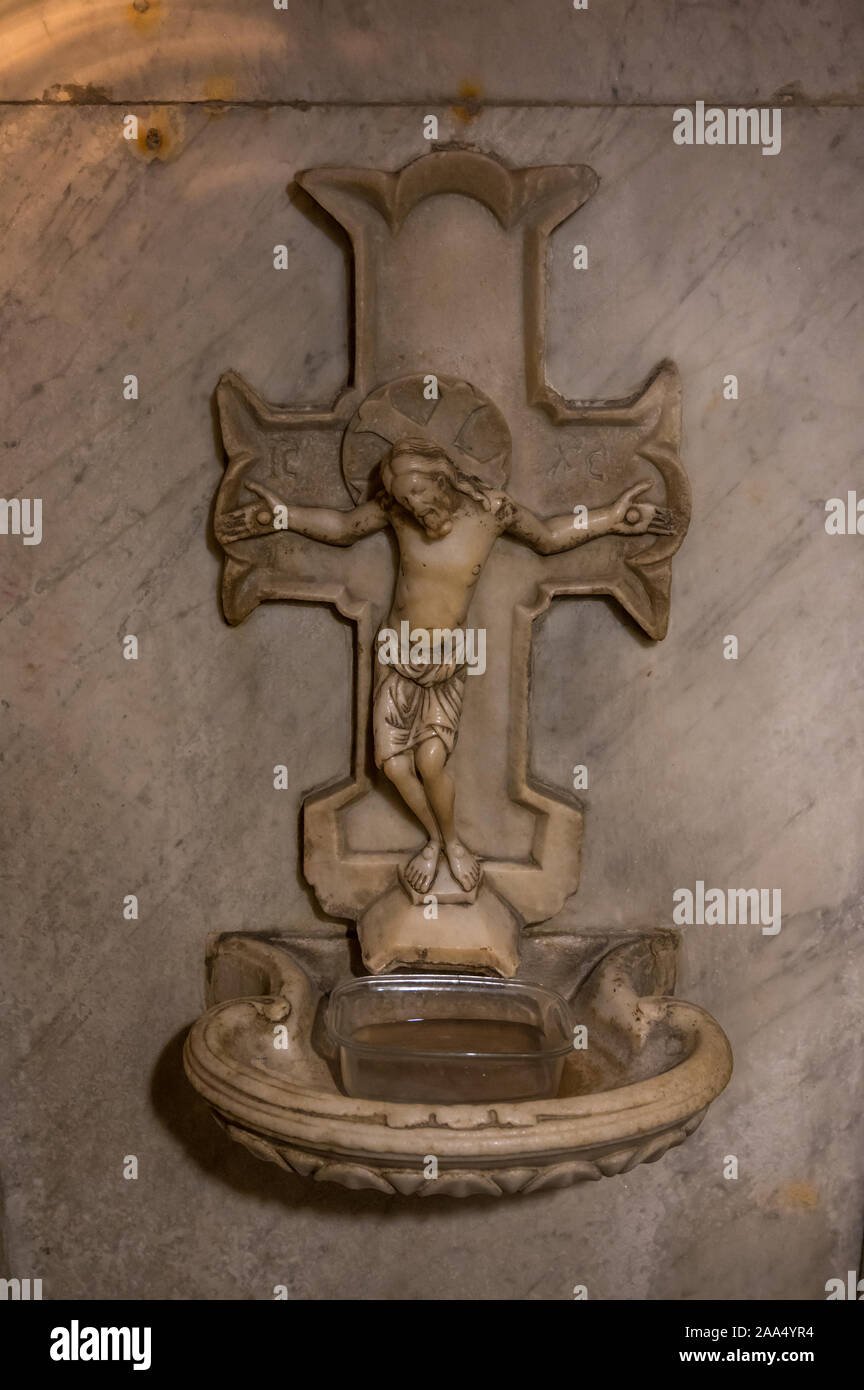 Holy water in fountain in the basilica of St. Nicholas in Bari, Italy ...