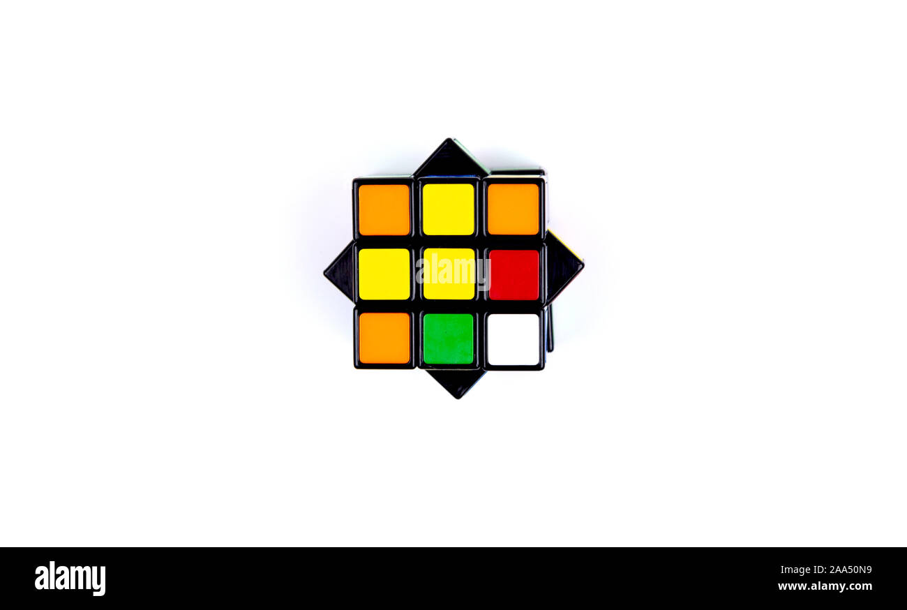 Game multi-colored cube on a white background. Game concept with copy space for text. Stock Photo