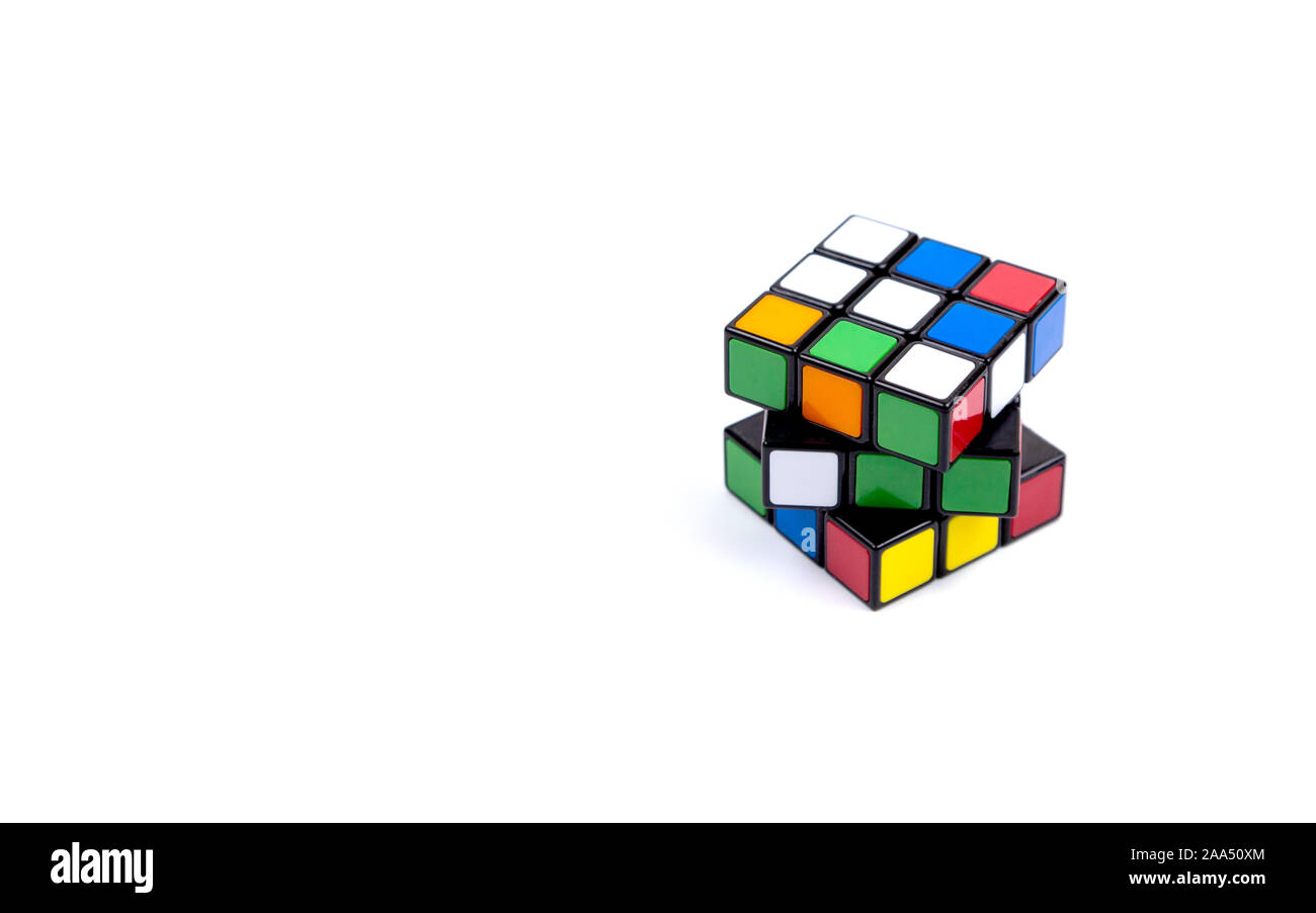 Game multi-colored cube on a white background. Game concept with copy space for text. Stock Photo