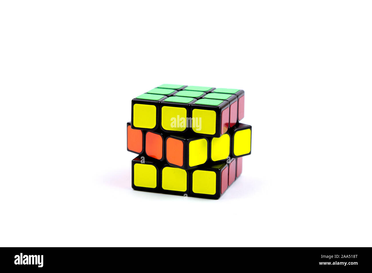 Game multi-colored cube on a white background. Game concept with copy space for text. Stock Photo