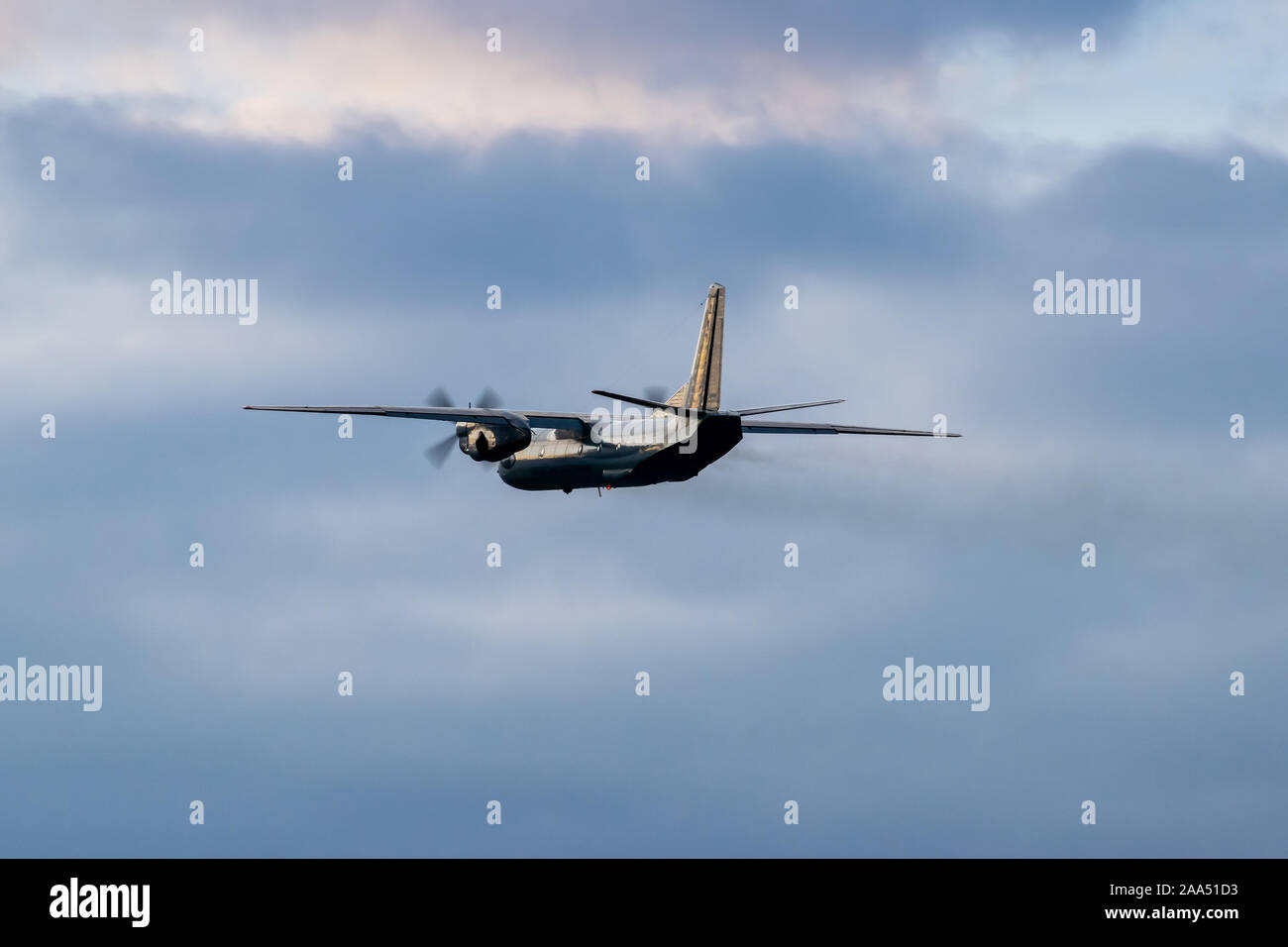 Turboprop cargo plane is taking off on sunset Stock Photo - Alamy