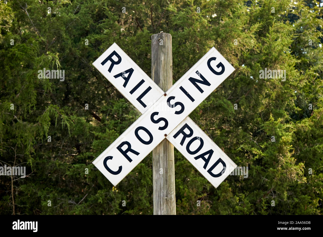 old wooden railroad crossing sign in rural usa Stock Photo