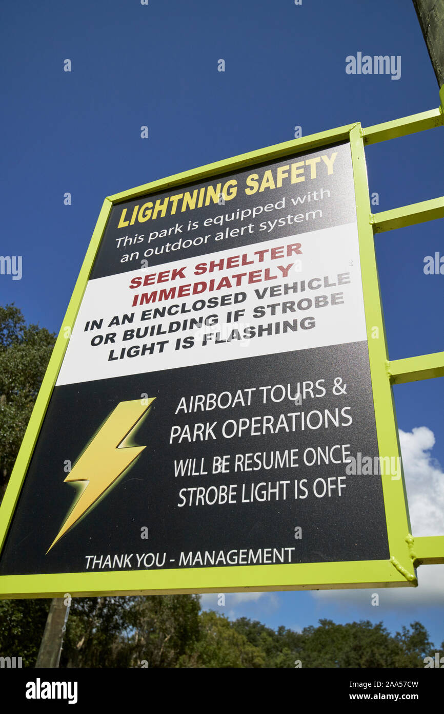 lightning storm safety warning sign at a tourist attraction in florida usa Stock Photo