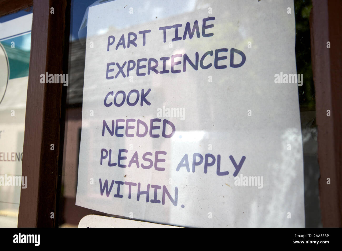 part time experienced cook job advert in the window of a restaurant florida usa Stock Photo