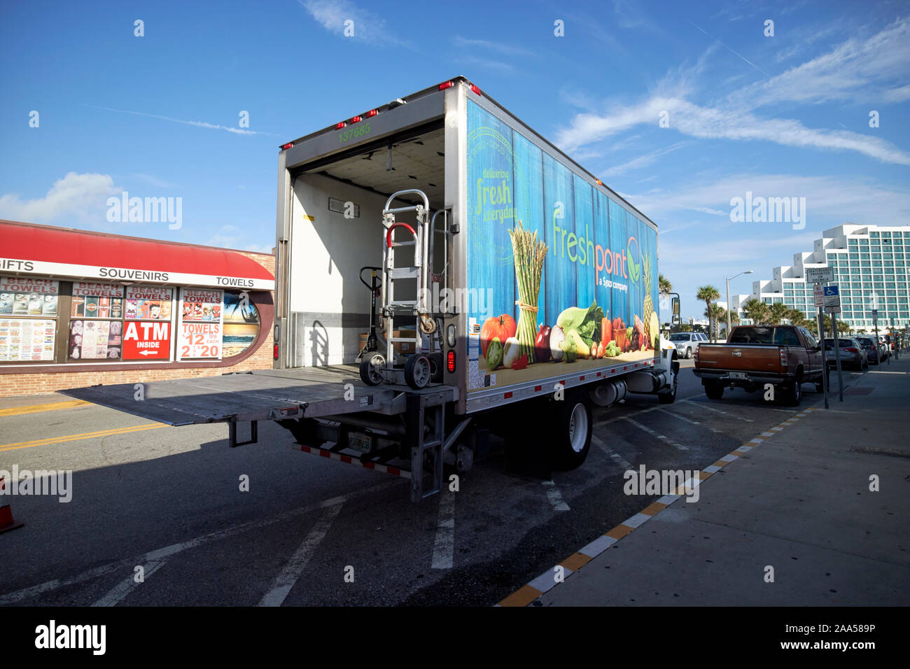 freshpoint produce distributor local fresh food deliveries early morning tail lift van florida usa Stock Photo