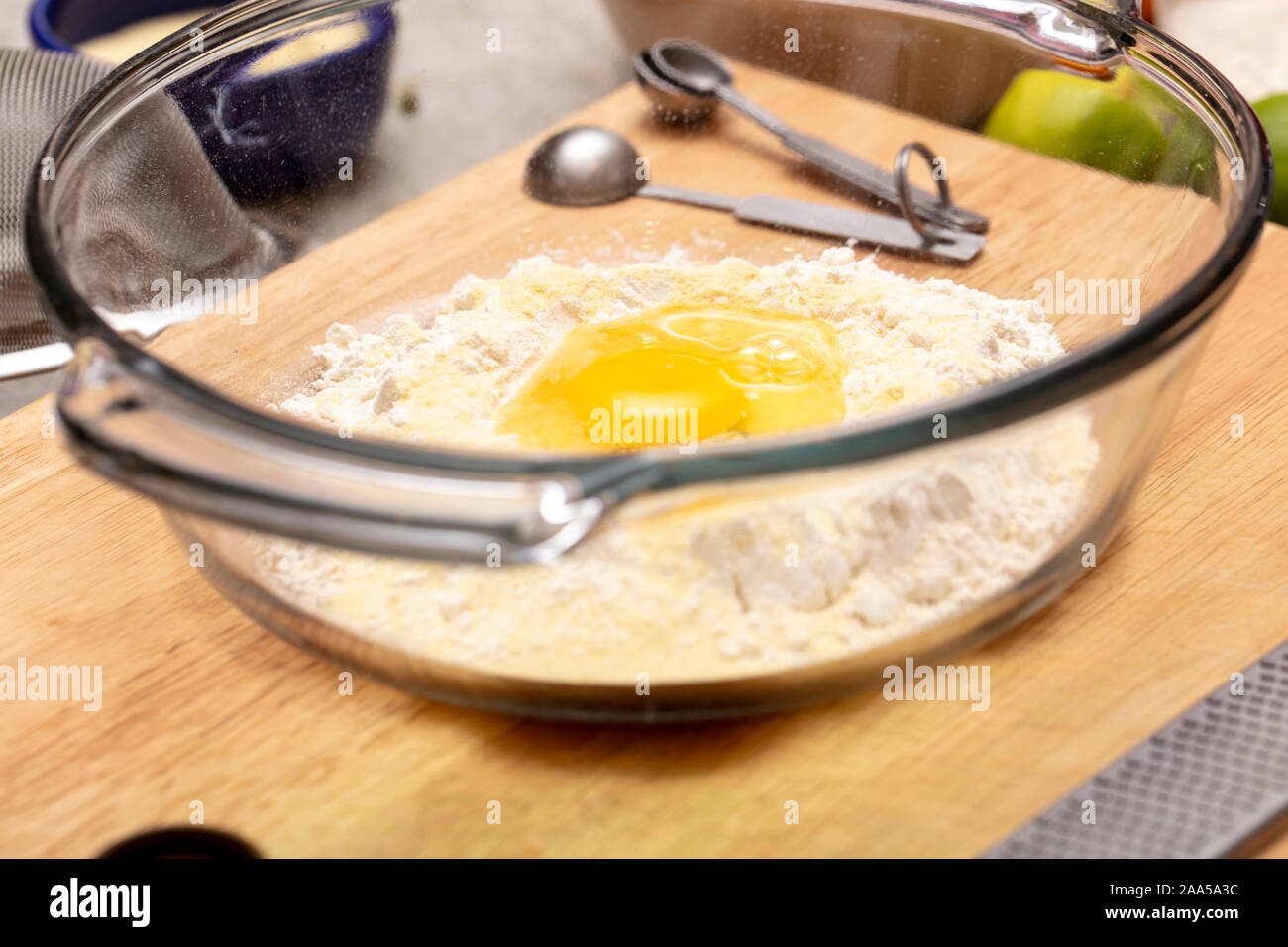 Pasta dough being made with flour and eggs during a pasta making class Stock Photo