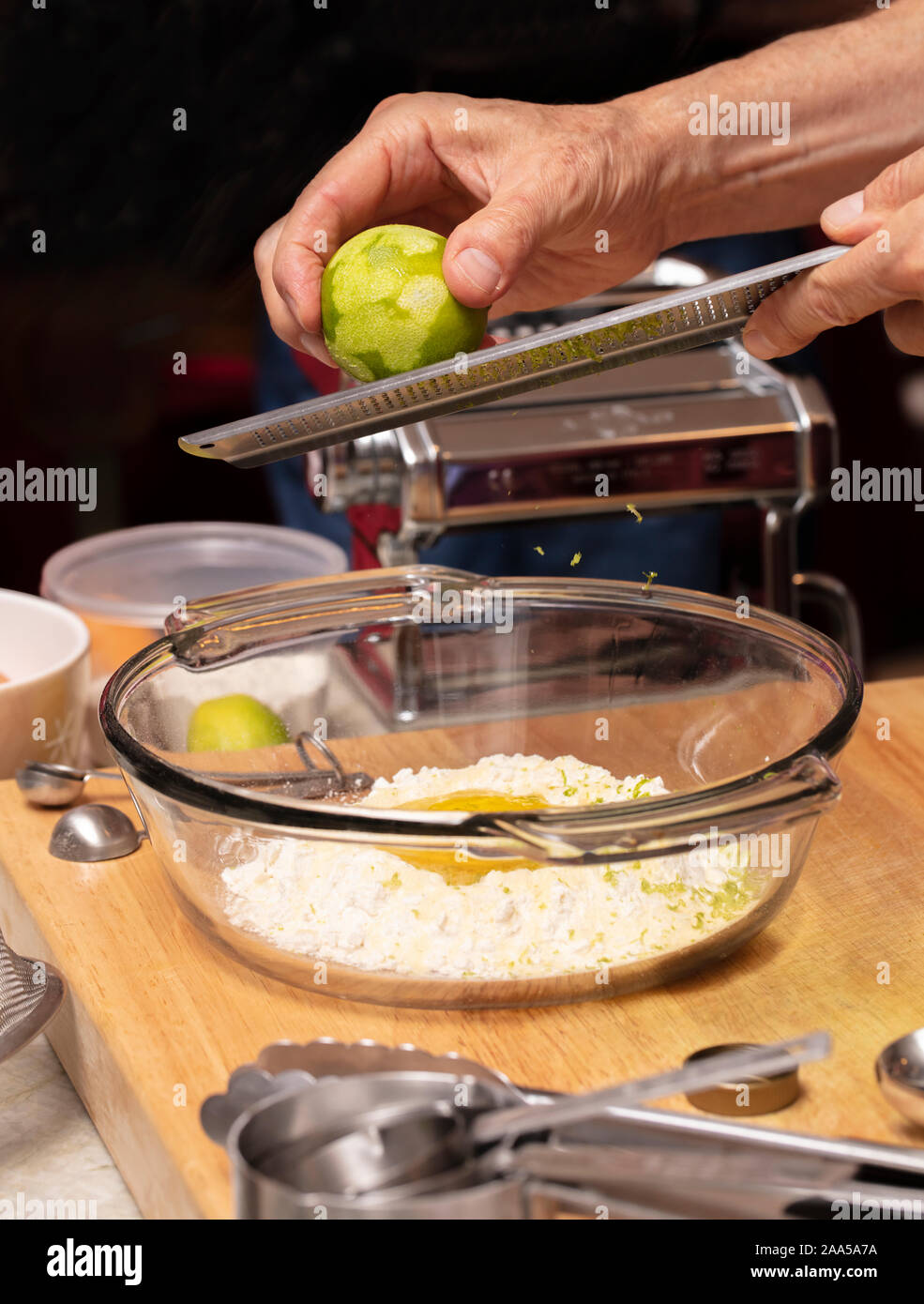 Citrus flavored pasta dough being prepared during a pasta class Stock Photo