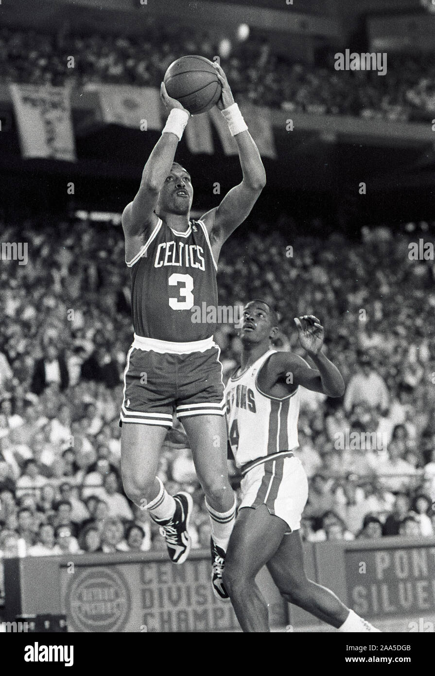 Boston Celtics #3 Dennis Johnson scores past Detroit Pistons #4 Joe Dumars in 1988 NBA playoffs game action in Detroit Michigan May 1988 photo by bill belknap Stock Photo