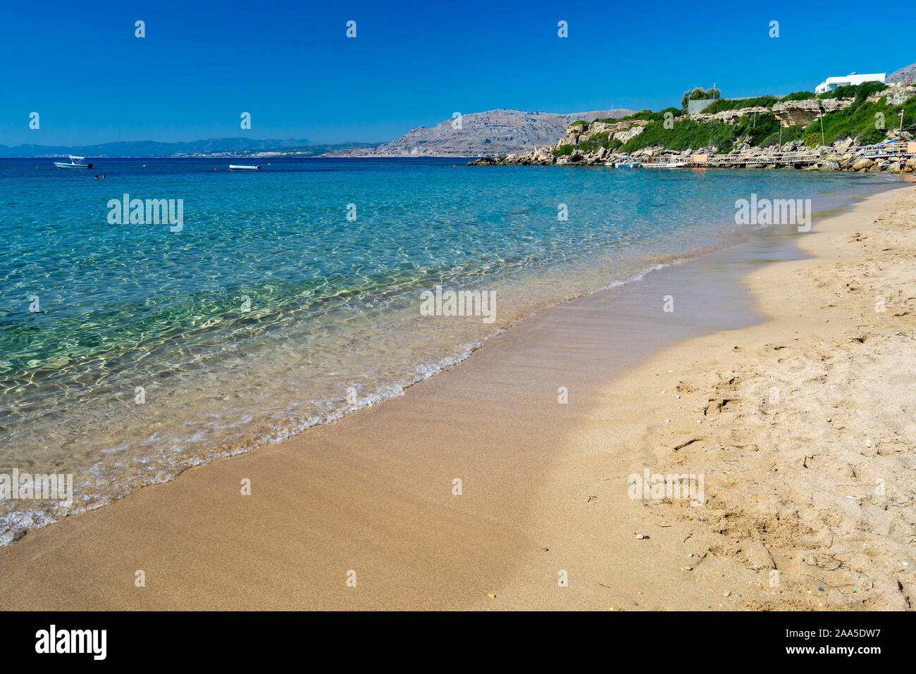 Beautiful summers day at Pefkos Beach or Pefki on the Greek Island of Rhodes Greece Europe Stock Photo
