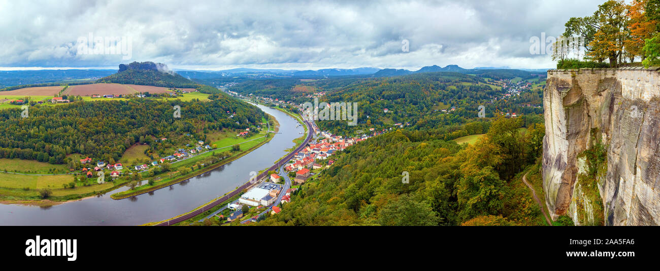 Aerial panormaic view of the Elbe valley with the Konigstein town and the Konigstein fortress, surrounded by forests. Saxony, Germany. Stock Photo