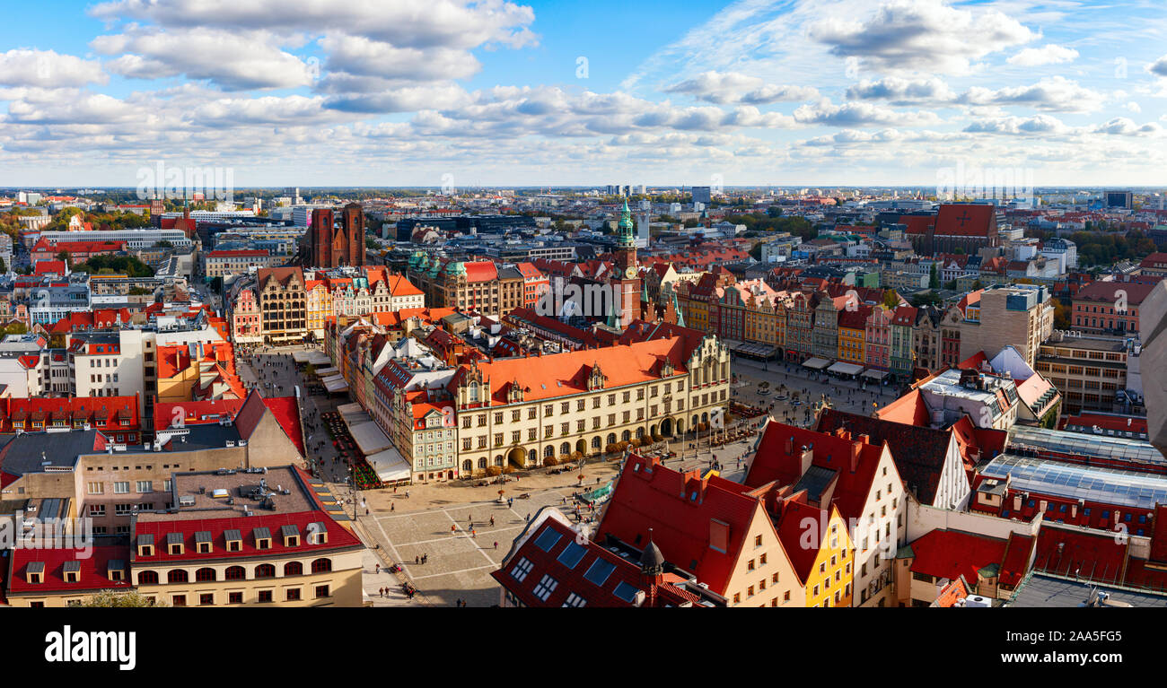 Aerial panoramic view of the Wroclaw historical city centre with the colorful houses of the Market Square on a sunny afternoon. Wroclaw, Poland. Stock Photo