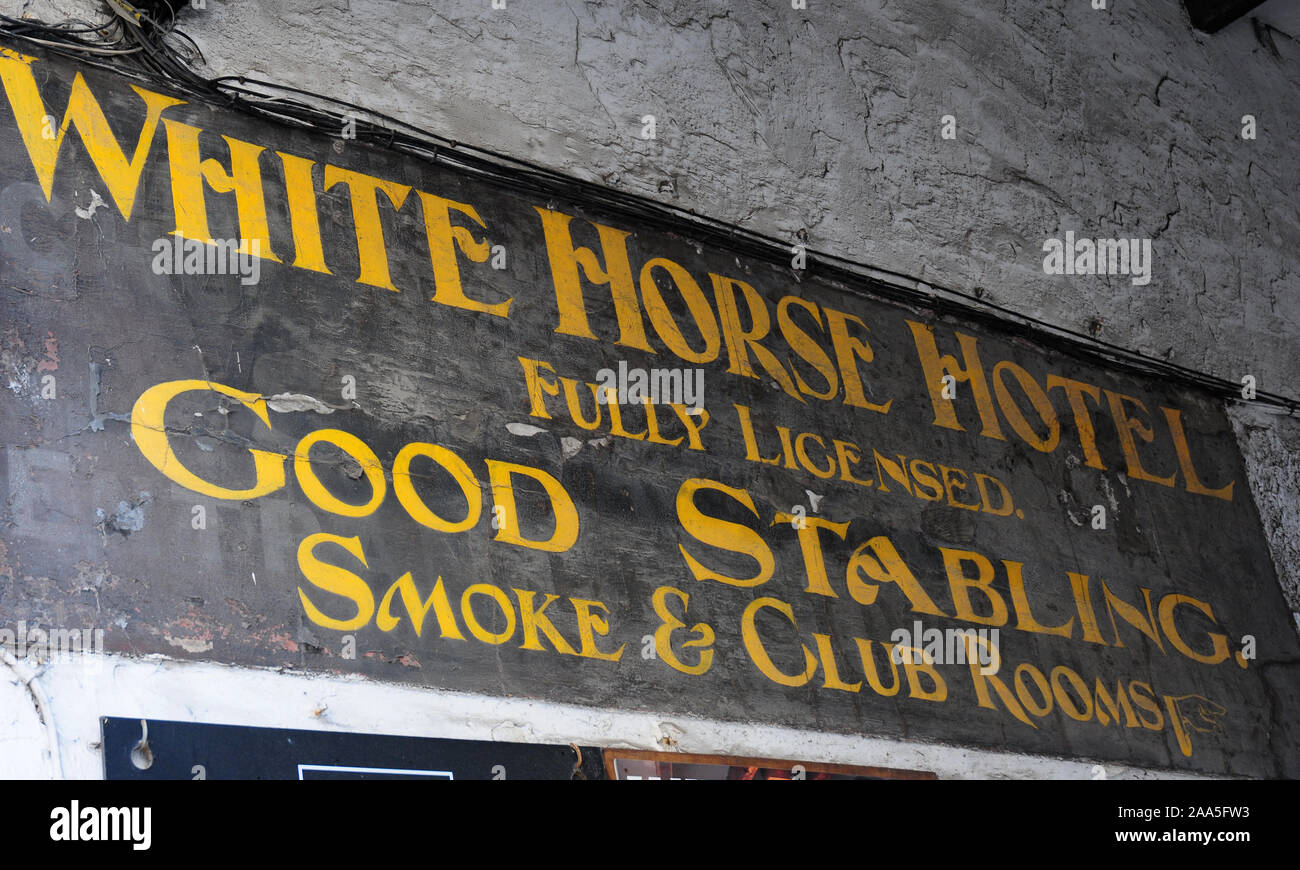 Old notice on White Horse and Griffin Hotel, Whitby. Stock Photo